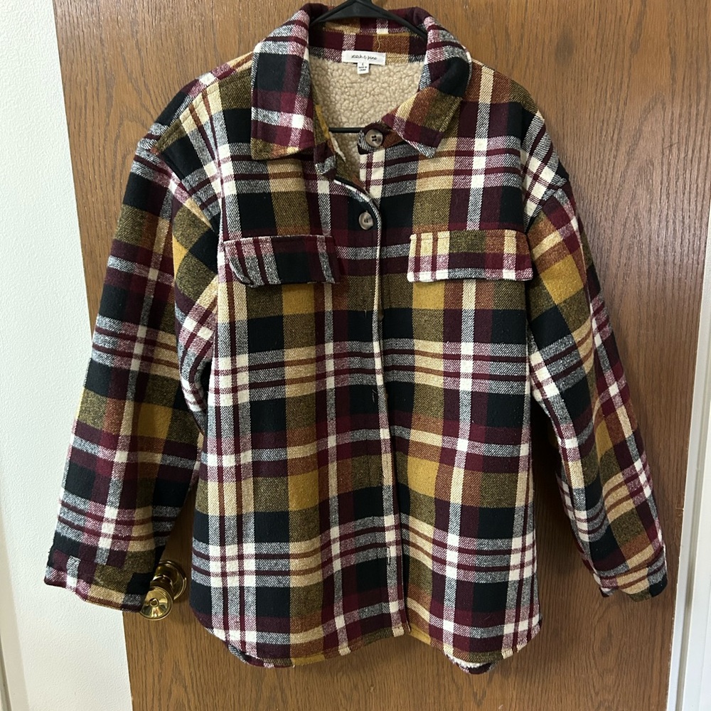 Women’s large plaid stitch and pine button up top